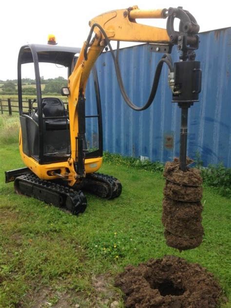 mini digger post hole auger|mini excavator post hole auger.